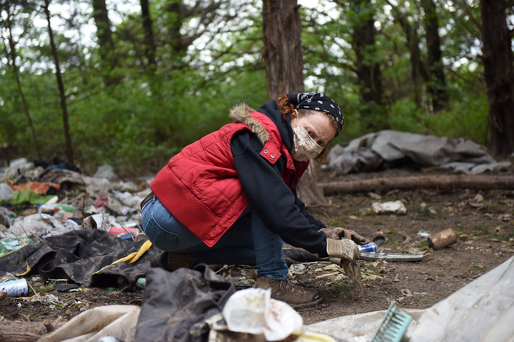 Volunteer Renee Maxwell picks up trash